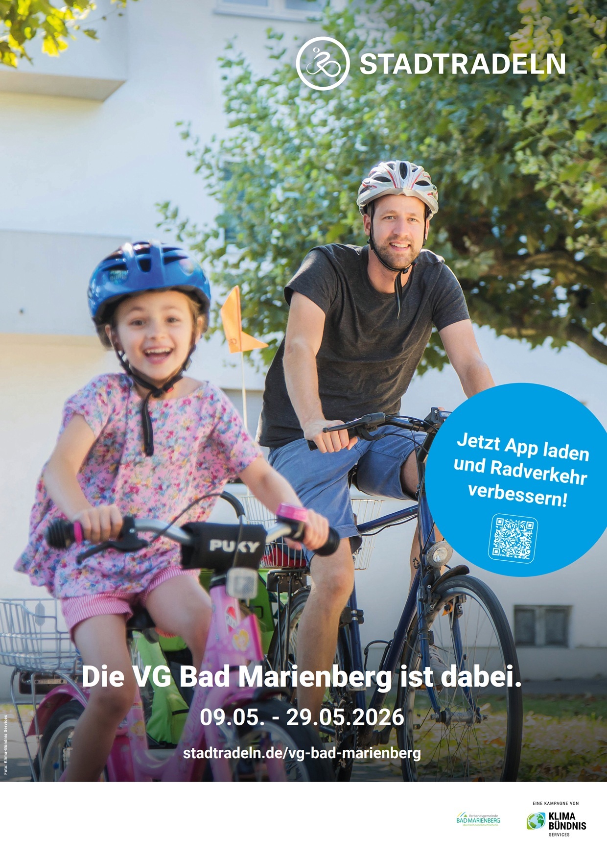 Vater und Kind auf dem Rad