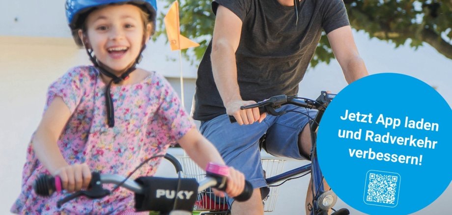 Vater und Kind auf dem Rad